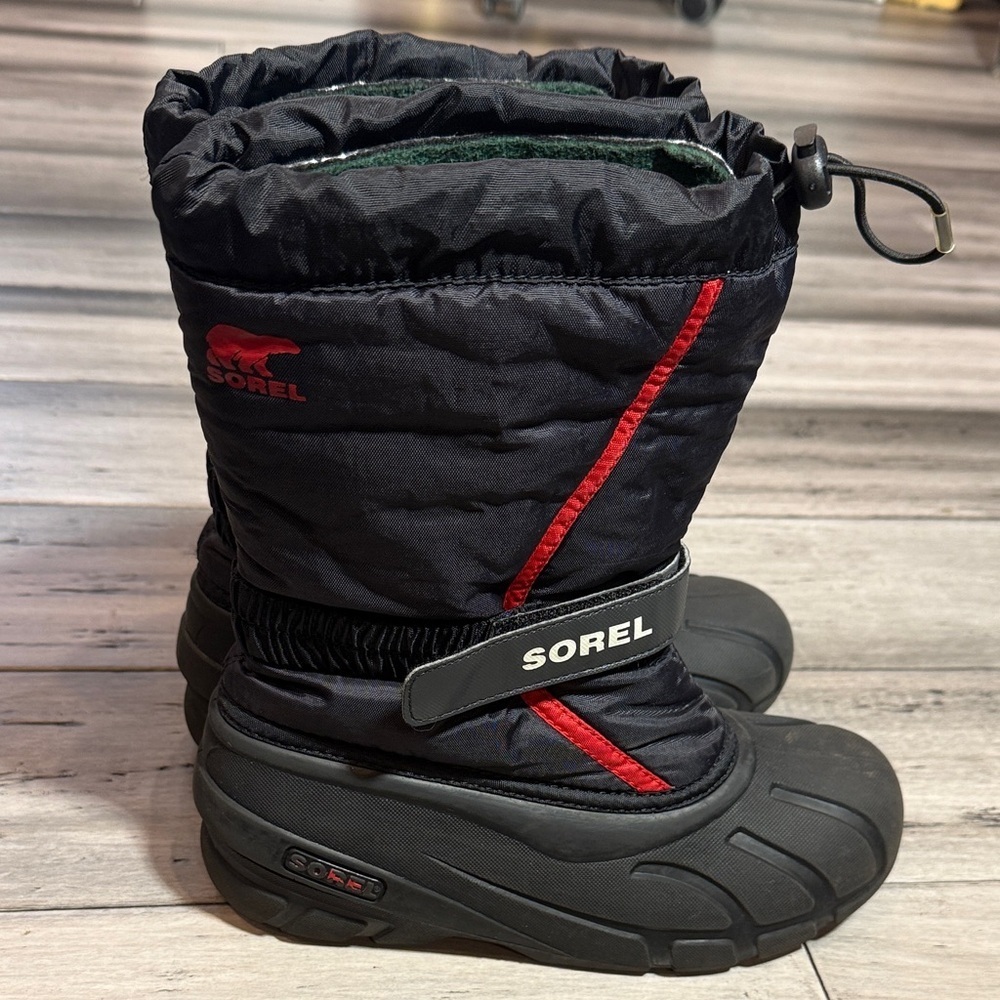 Sorel Men  Black Winter Boots with Red Accents